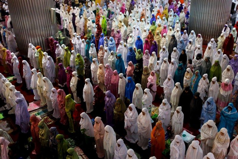 Muslim women attend Ramadan tarawih prayer at Istiqlal mosque in Jakarta, Indonesia