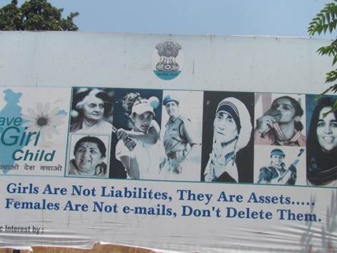 A billboard in the northern Indian state of Jammu and Kashmir promotes gender equality and protests violence against women. Credit: Athar Parvaiz/IPS