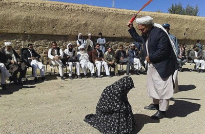 Woman being lashed in public in Ghor province for adultery
