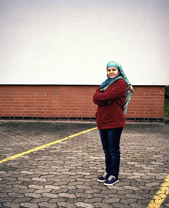 Fadia Al-Khatib, mother of five, traveled to Germany by  herself. Photograph courtesy of German photographer Corinna Mehl.